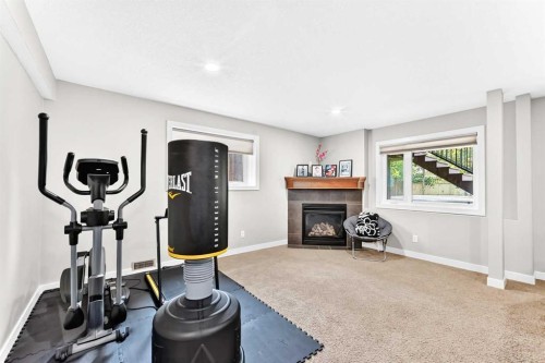 23 Everoak Bay Sw, Calgary, AB - Indoor With Fireplace