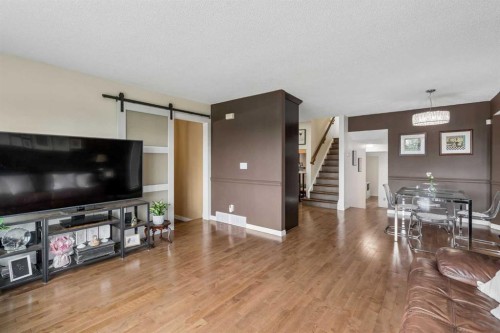 744 Riverbend Drive Se, Calgary, AB - Indoor Photo Showing Living Room