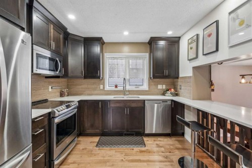 744 Riverbend Drive Se, Calgary, AB - Indoor Photo Showing Kitchen With Stainless Steel Kitchen With Upgraded Kitchen