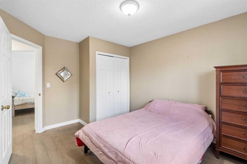 744 Riverbend Drive Se, Calgary, AB - Indoor Photo Showing Bedroom