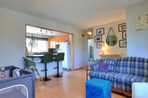 108 Pinecliff Way Ne, Calgary, AB - Indoor Photo Showing Living Room
