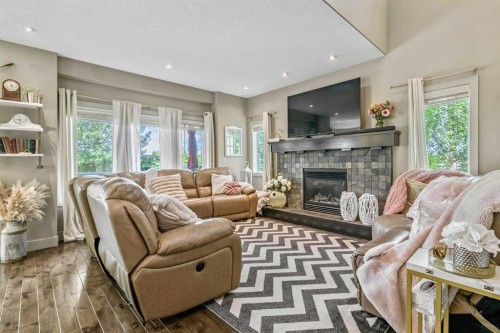 315 Mahogany Court Se, Calgary, AB - Indoor Photo Showing Living Room With Fireplace