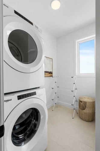 8493 21 Avenue Se, Calgary, AB - Indoor Photo Showing Laundry Room