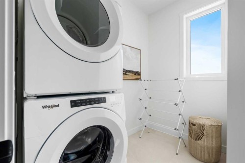 8493 21 Avenue Se, Calgary, AB - Indoor Photo Showing Laundry Room
