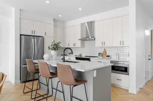 8493 21 Avenue Se, Calgary, AB - Indoor Photo Showing Kitchen With Stainless Steel Kitchen With Upgraded Kitchen
