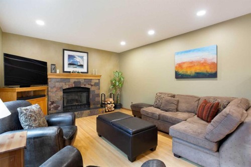 337 Sandringham Court Nw, Calgary, AB - Indoor Photo Showing Living Room With Fireplace