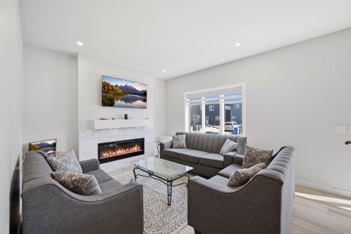 96 Homestead Grove Ne, Calgary, AB - Indoor Photo Showing Living Room With Fireplace