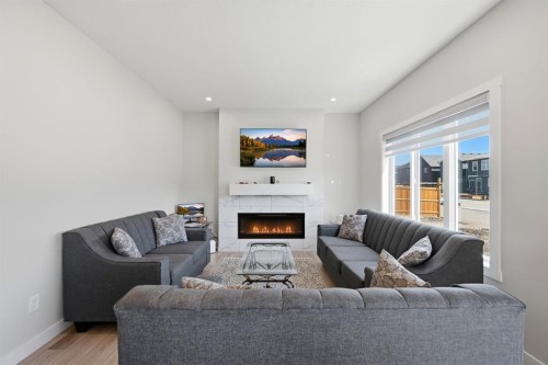 96 Homestead Grove Ne, Calgary, AB - Indoor Photo Showing Living Room With Fireplace