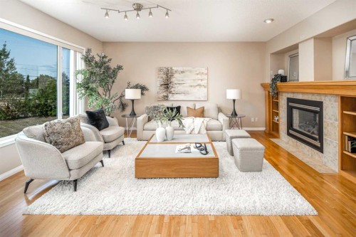 66 Royal Oak Grove Nw, Calgary, AB - Indoor Photo Showing Living Room With Fireplace