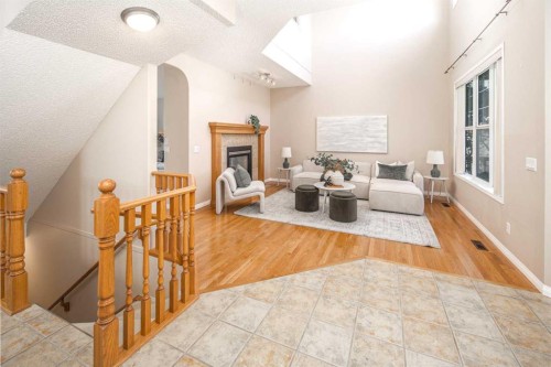66 Royal Oak Grove Nw, Calgary, AB - Indoor With Fireplace