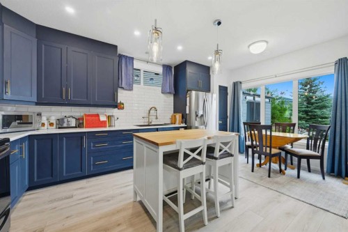 224 Kingston Way Se, Airdrie, AB - Indoor Photo Showing Kitchen With Upgraded Kitchen