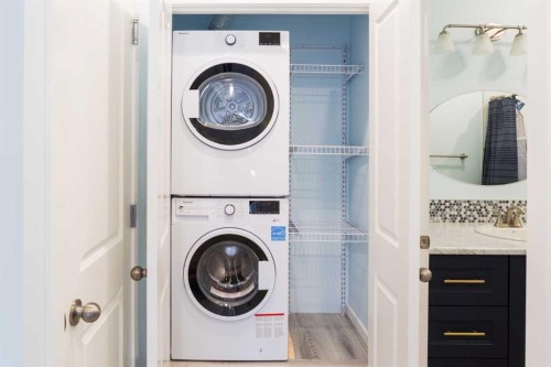 224 Kingston Way Se, Airdrie, AB - Indoor Photo Showing Laundry Room