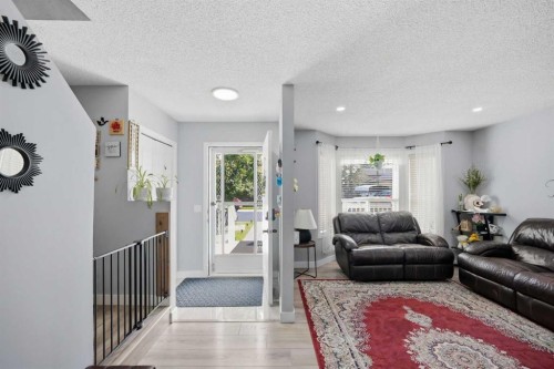 9 Martindale Crescent Ne, Calgary, AB - Indoor Photo Showing Living Room