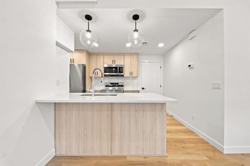 189 148 Avenue Nw, Calgary, AB - Indoor Photo Showing Kitchen With Upgraded Kitchen