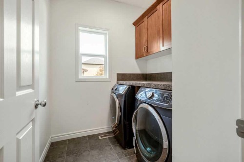 134 Prestwick Terrace Se, Calgary, AB - Indoor Photo Showing Laundry Room