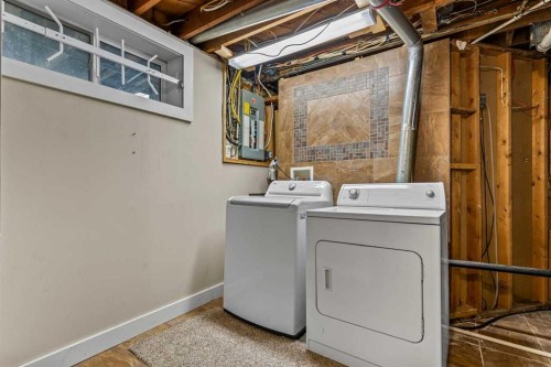 127 Fredson Drive Se, Calgary, AB - Indoor Photo Showing Laundry Room