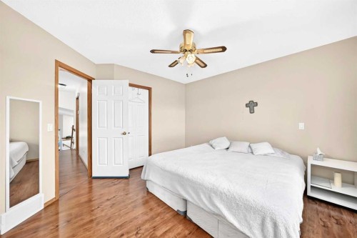 98 Country Hills Heights Nw, Calgary, AB - Indoor Photo Showing Bedroom