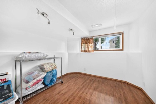 98 Country Hills Heights Nw, Calgary, AB - Indoor Photo Showing Other Room