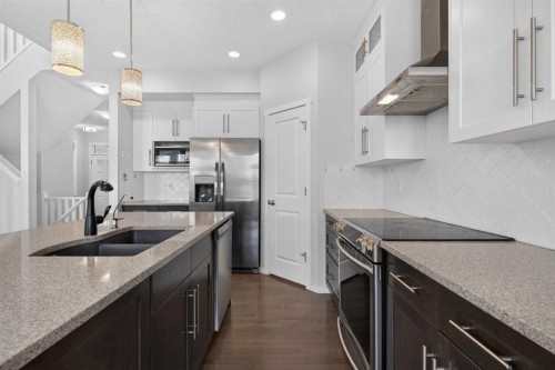 80 Nolancrest Green Nw, Calgary, AB - Indoor Photo Showing Kitchen With Stainless Steel Kitchen With Double Sink With Upgraded Kitchen