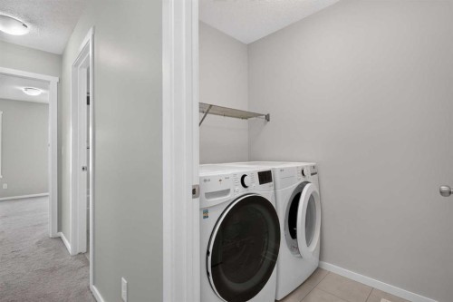 80 Nolancrest Green Nw, Calgary, AB - Indoor Photo Showing Laundry Room