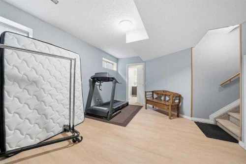 2855 Catalina Boulevard Ne, Calgary, AB - Indoor Photo Showing Gym Room