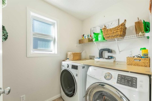 204 Paint Horse Drive, Cochrane, AB - Indoor Photo Showing Laundry Room