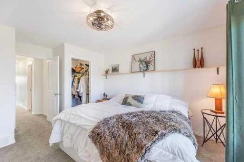 204 Paint Horse Drive, Cochrane, AB - Indoor Photo Showing Bedroom