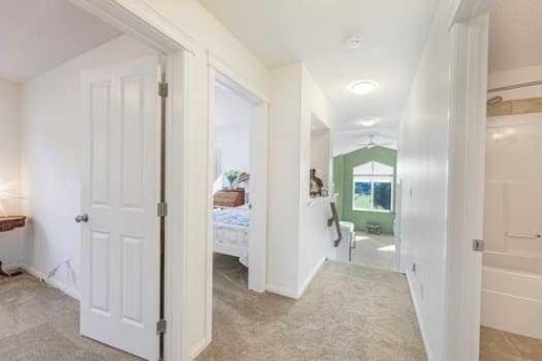 204 Paint Horse Drive, Cochrane, AB - Indoor Photo Showing Other Room