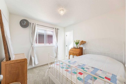 204 Paint Horse Drive, Cochrane, AB - Indoor Photo Showing Bedroom