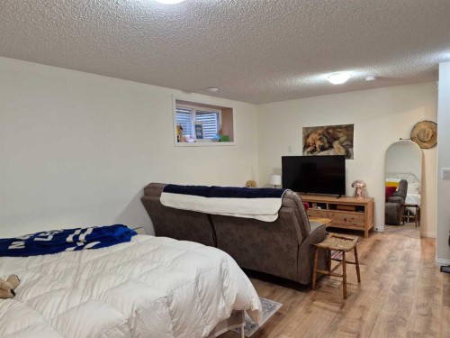 204 Paint Horse Drive, Cochrane, AB - Indoor Photo Showing Bedroom