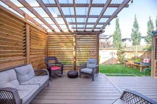 204 Paint Horse Drive, Cochrane, AB - Outdoor With Deck Patio Veranda With Exterior