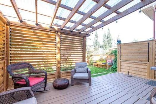 204 Paint Horse Drive, Cochrane, AB - Outdoor With Deck Patio Veranda With Exterior
