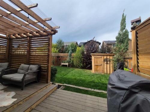 204 Paint Horse Drive, Cochrane, AB - Outdoor With Deck Patio Veranda With Exterior