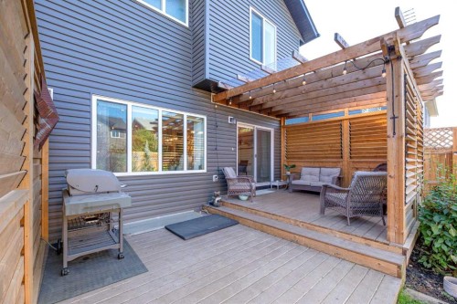 204 Paint Horse Drive, Cochrane, AB - Outdoor With Deck Patio Veranda With Exterior