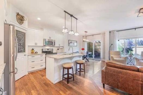 204 Paint Horse Drive, Cochrane, AB - Indoor Photo Showing Kitchen With Upgraded Kitchen