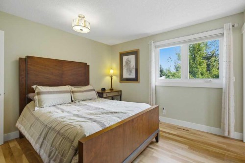 736 Canfield Place Sw, Calgary, AB - Indoor Photo Showing Bedroom