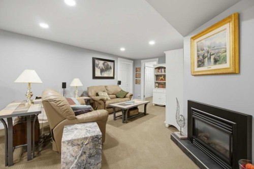 736 Canfield Place Sw, Calgary, AB - Indoor Photo Showing Other Room With Fireplace
