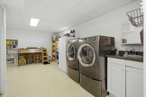 736 Canfield Place Sw, Calgary, AB - Indoor Photo Showing Laundry Room