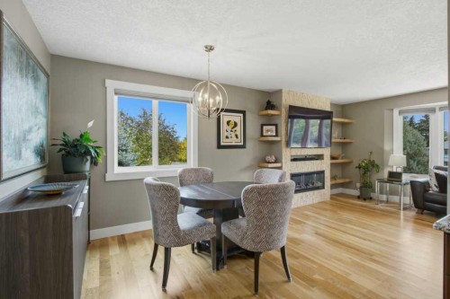736 Canfield Place Sw, Calgary, AB - Indoor Photo Showing Other Room With Fireplace