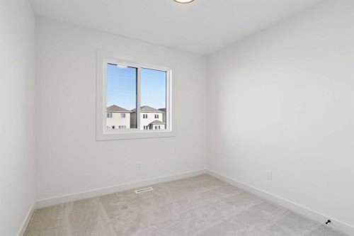 294 Belvedere Avenue Se, Calgary, AB - Indoor Photo Showing Other Room