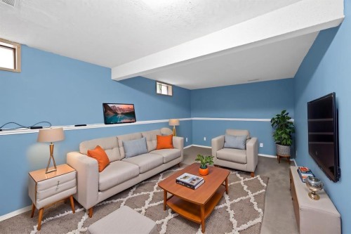 20 Falton Way Ne, Calgary, AB - Indoor Photo Showing Living Room