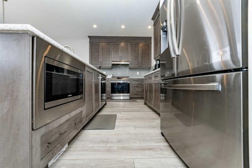 717 Windrow Manor Sw, Airdrie, AB - Indoor Photo Showing Kitchen With Stainless Steel Kitchen