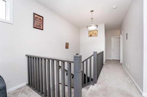 717 Windrow Manor Sw, Airdrie, AB - Indoor Photo Showing Other Room