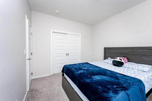 717 Windrow Manor Sw, Airdrie, AB - Indoor Photo Showing Bedroom