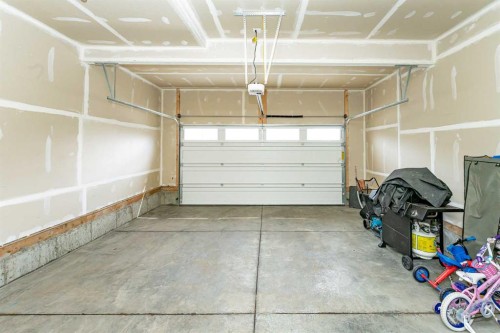 717 Windrow Manor Sw, Airdrie, AB - Indoor Photo Showing Garage