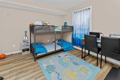 208-2000 Applevillage Court Se, Calgary, AB - Indoor Photo Showing Bedroom