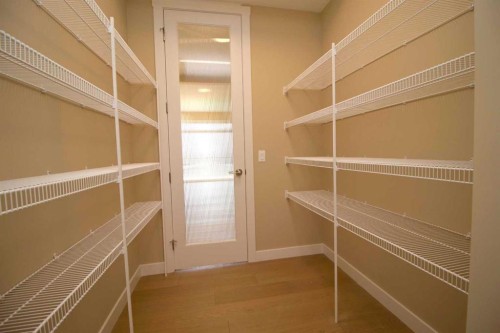 127 Sundown Crescent, Cochrane, AB - Indoor With Storage