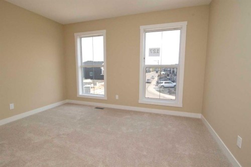 127 Sundown Crescent, Cochrane, AB - Indoor Photo Showing Other Room