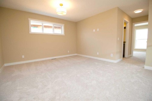 127 Sundown Crescent, Cochrane, AB - Indoor Photo Showing Other Room
