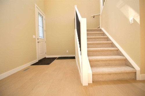 127 Sundown Crescent, Cochrane, AB - Indoor Photo Showing Other Room